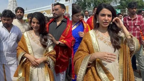 Watch: Raj Nidimoru Shields Wife Samantha Ruth Prabhu from Massive Crowd at Tirumala Temple